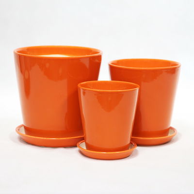 kaufen Innenarchitektur Handgefertigte orangefarbene Keramikpfannen mit Drainageöffnungen online manufacture