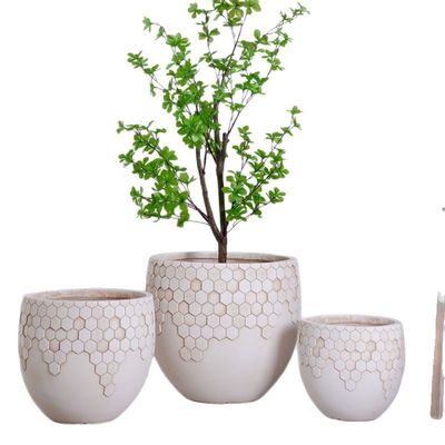 kaufen Wohlstand Honighals Struktur Muster Neutral beige Runde Fiber Clay Planter Dekoration online manufacture