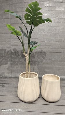 kaufen Zeitgenössischer Look Neutral beige wiederholt lineare Textur Design Runder Fiber Clay Planter online manufacture
